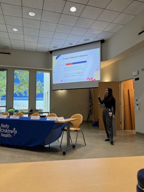 Firearm Safety, Megan Tran-Helflinger, Scrubs Addressing the Firearm Epidemic  