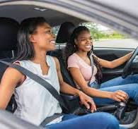 Dr. Ben Hoffman teaching teenagers how to drive safely 